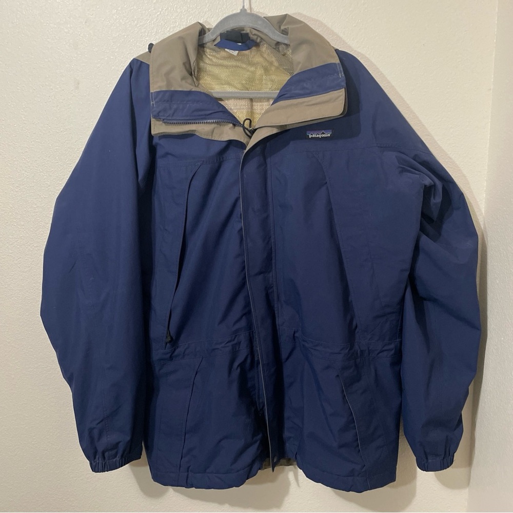 Patagonia Blue Raincoat with Tan Collar and Water-Resistant Material